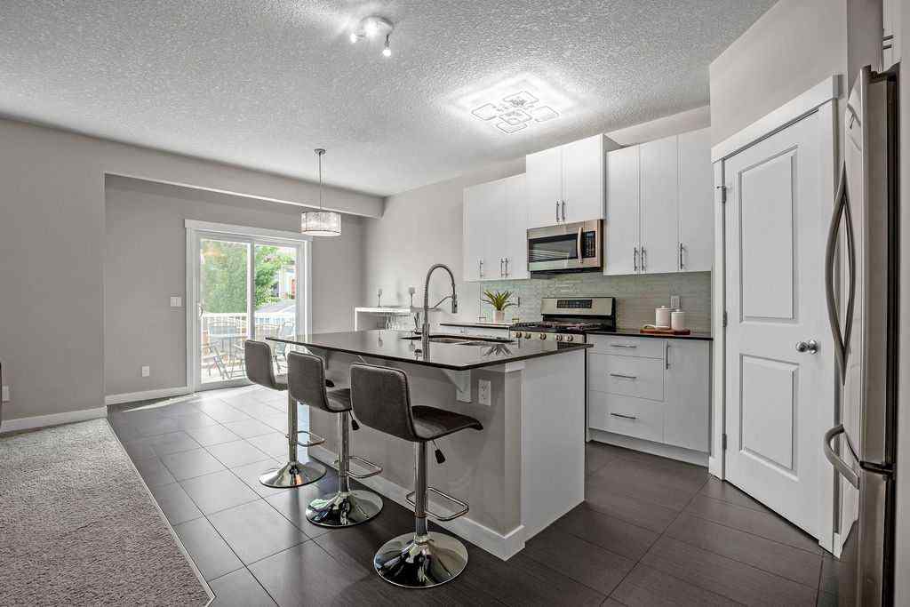 MLS® A2242729 - 1208 Brightoncrest Green SE in New Brighton Calgary, Residential