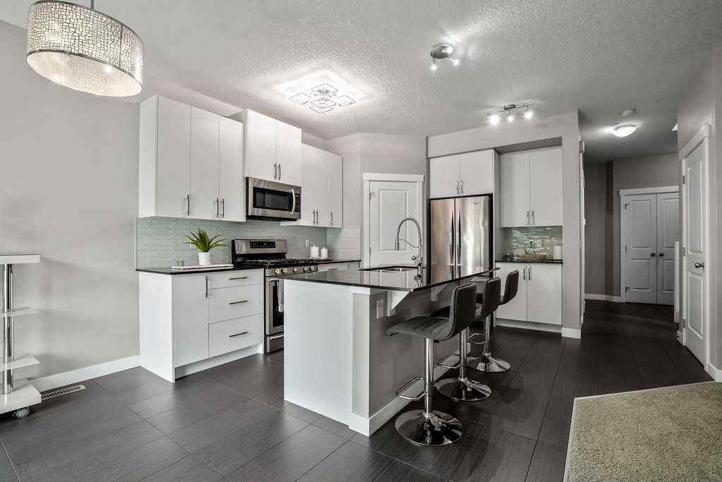 MLS® A2242729 - 1208 Brightoncrest Green SE in New Brighton Calgary, Residential
