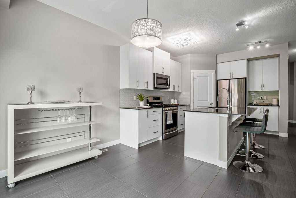MLS® A2242729 - 1208 Brightoncrest Green SE in New Brighton Calgary, Residential
