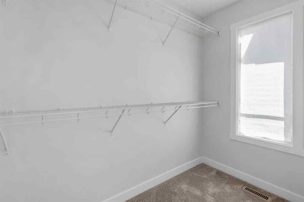 MLS® A2242742 - 135 Lucas Boulevard NW in Livingston Calgary, Residential