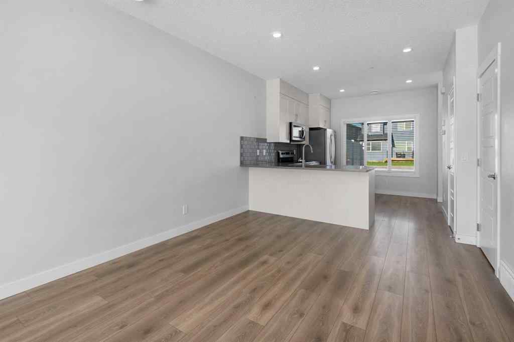 MLS® A2242742 - 135 Lucas Boulevard NW in Livingston Calgary, Residential