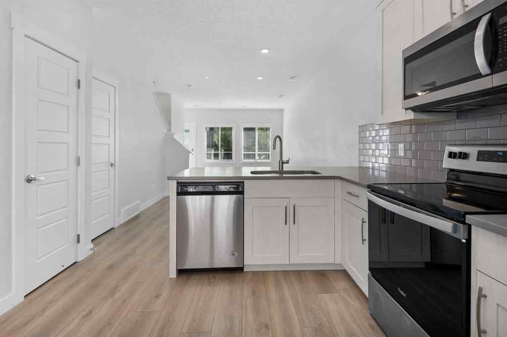 MLS® A2242742 - 135 Lucas Boulevard NW in Livingston Calgary, Residential