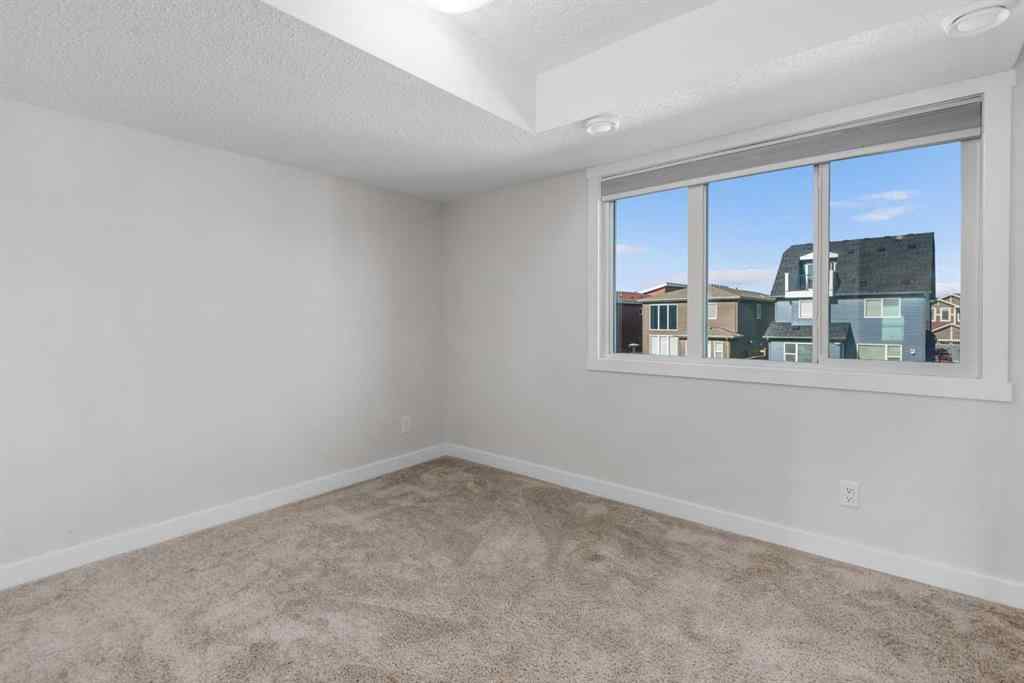 MLS® A2242742 - 135 Lucas Boulevard NW in Livingston Calgary, Residential