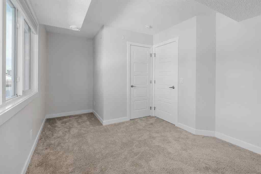 MLS® A2242742 - 135 Lucas Boulevard NW in Livingston Calgary, Residential