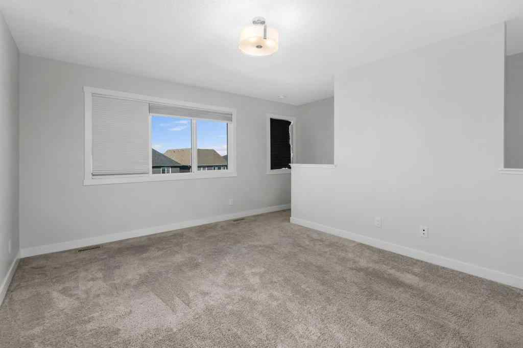 MLS® A2242742 - 135 Lucas Boulevard NW in Livingston Calgary, Residential