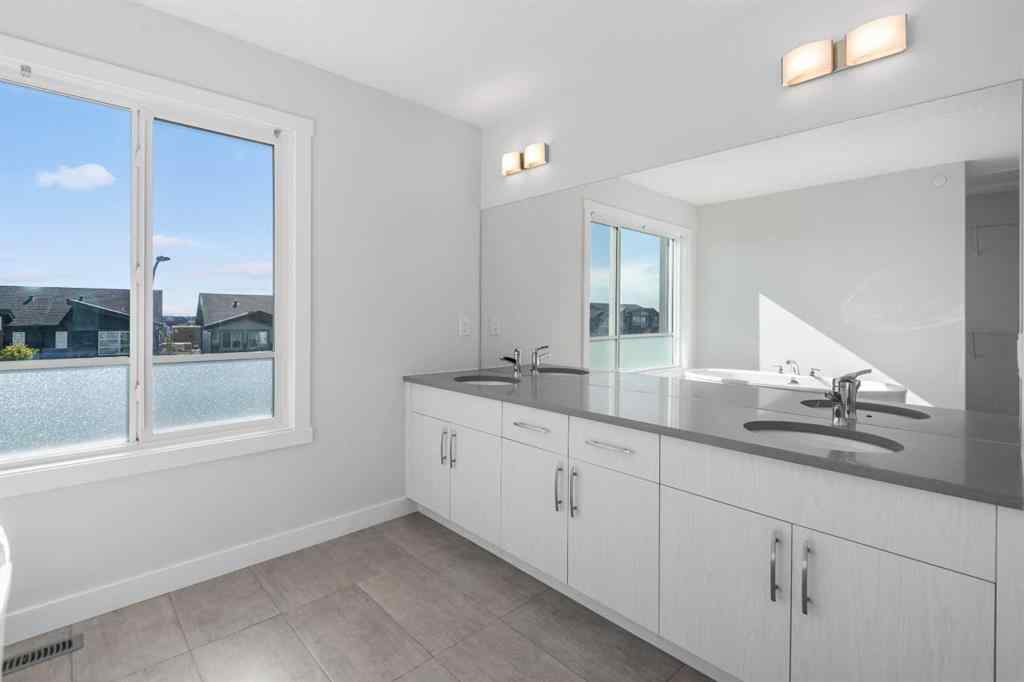 MLS® A2242742 - 135 Lucas Boulevard NW in Livingston Calgary, Residential