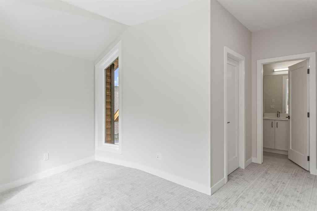 MLS® A2242749 - Unit #203J 209 Stewart Creek Rise  in Three Sisters Canmore, Residential
