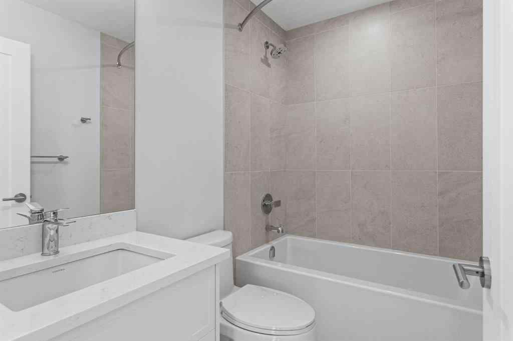 MLS® A2242749 - Unit #203J 209 Stewart Creek Rise  in Three Sisters Canmore, Residential