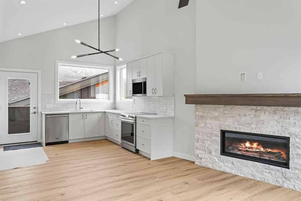 MLS® A2242749 - Unit #203J 209 Stewart Creek Rise  in Three Sisters Canmore, Residential