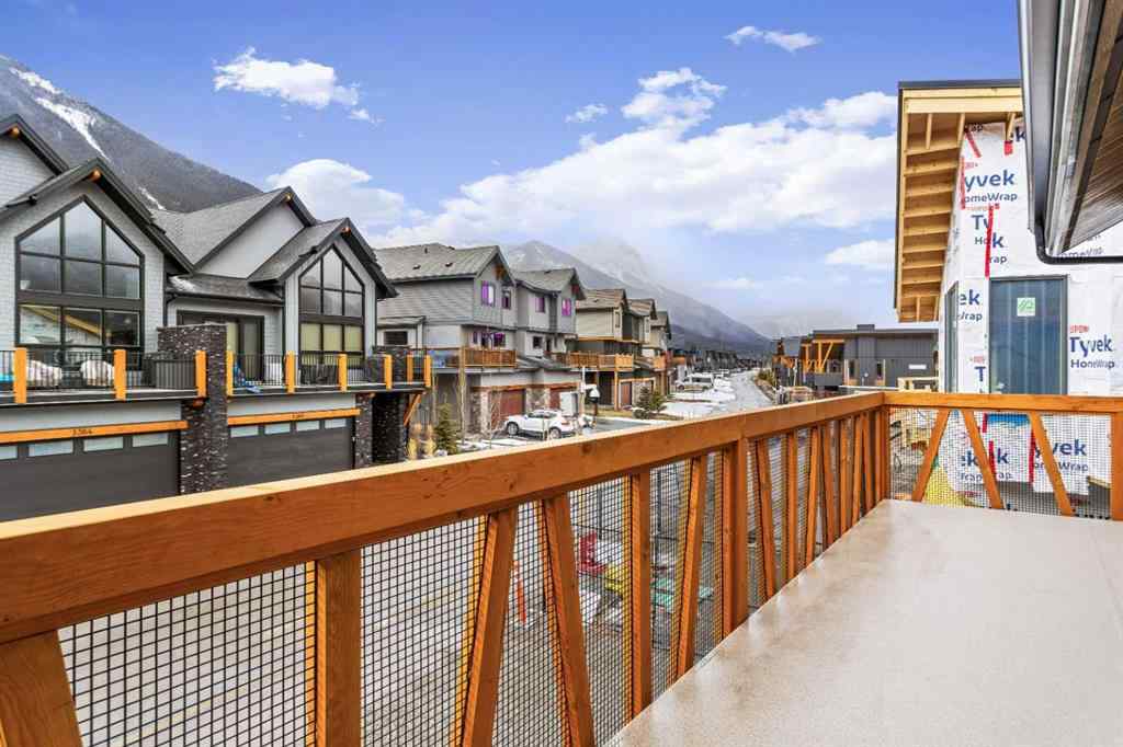 MLS® A2242749 - Unit #203J 209 Stewart Creek Rise  in Three Sisters Canmore, Residential