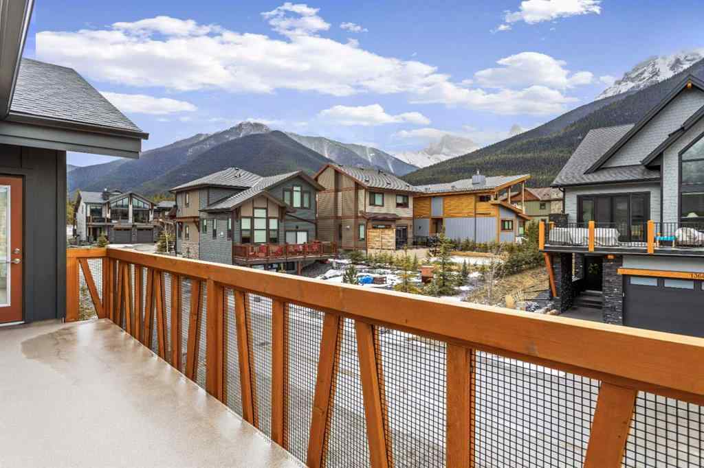 MLS® A2242749 - Unit #203J 209 Stewart Creek Rise  in Three Sisters Canmore, Residential