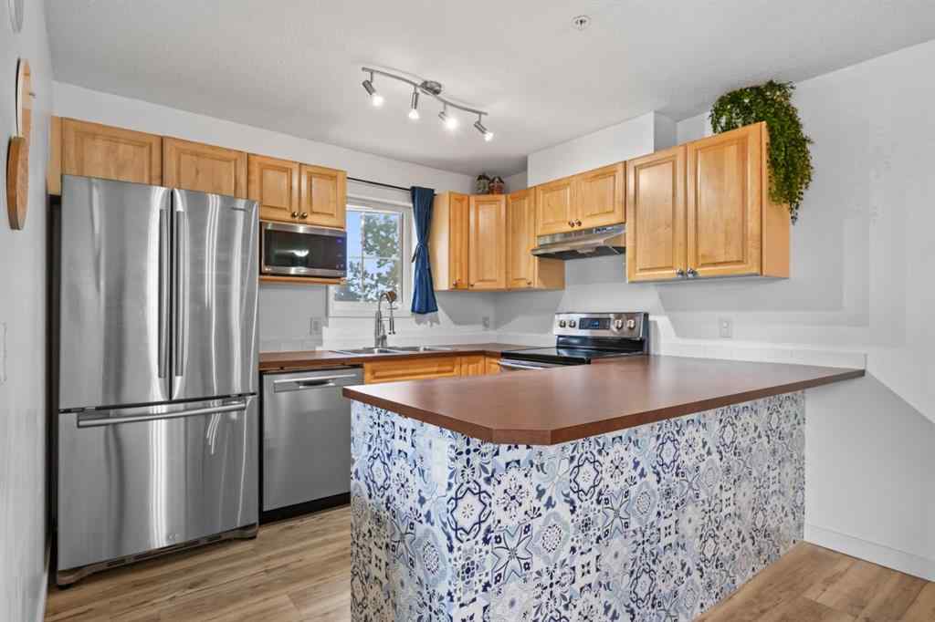 MLS® A2242800 - Unit #107 174 N Railway Street  in Heritage Okotoks Okotoks, Residential