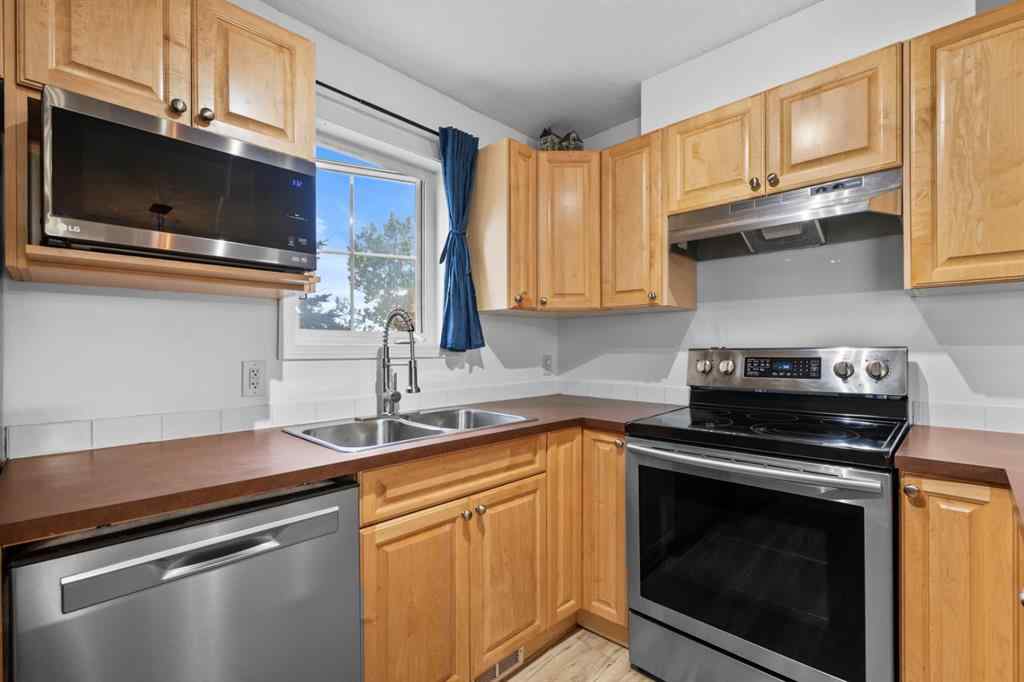 MLS® A2242800 - Unit #107 174 N Railway Street  in Heritage Okotoks Okotoks, Residential