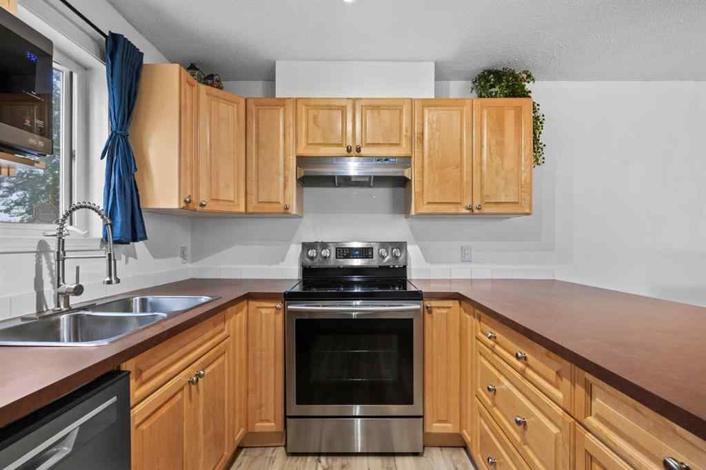 MLS® A2242800 - Unit #107 174 N Railway Street  in Heritage Okotoks Okotoks, Residential