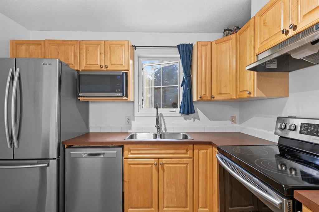 MLS® A2242800 - Unit #107 174 N Railway Street  in Heritage Okotoks Okotoks, Residential