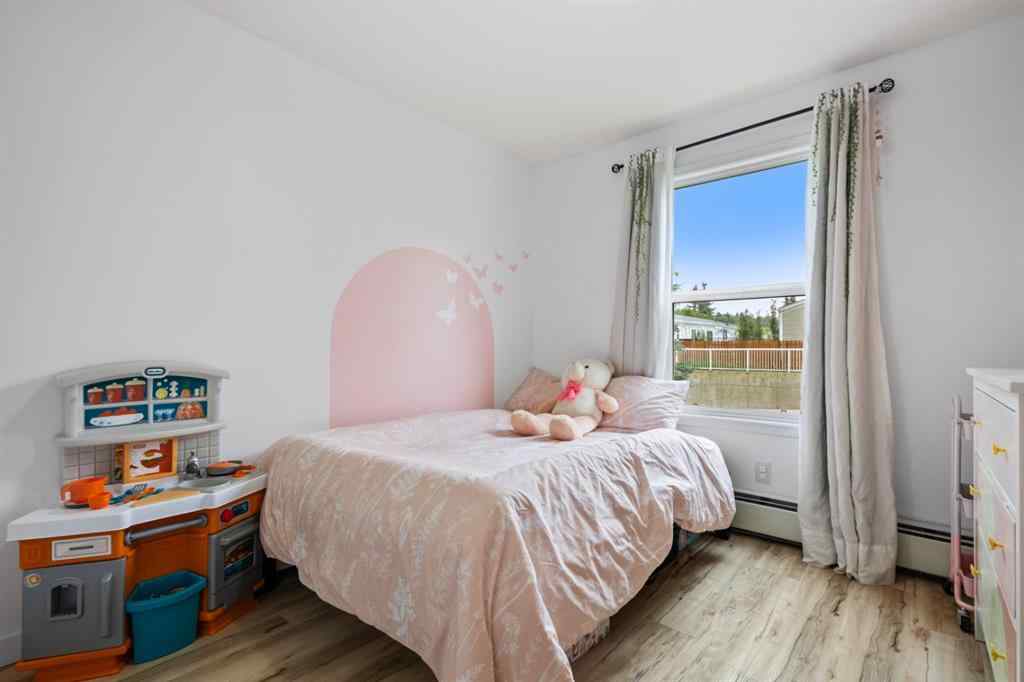 MLS® A2242800 - Unit #107 174 N Railway Street  in Heritage Okotoks Okotoks, Residential