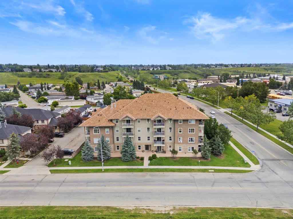 MLS® A2242800 - Unit #107 174 N Railway Street  in Heritage Okotoks Okotoks, Residential