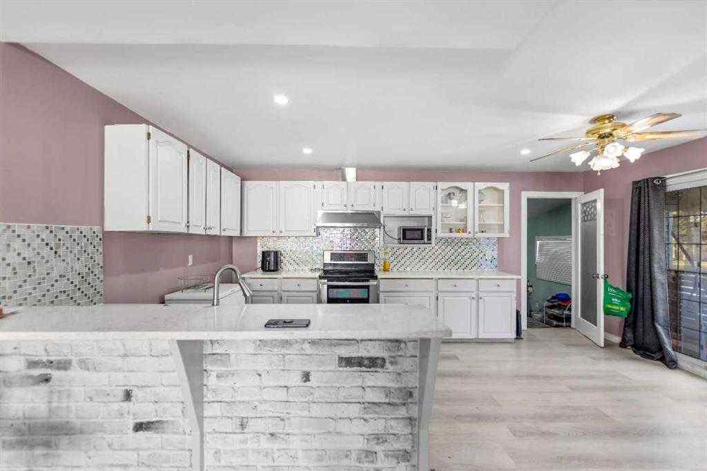 MLS® A2242804 - 632 55 Street SE in Penbrooke Meadows Calgary, Residential