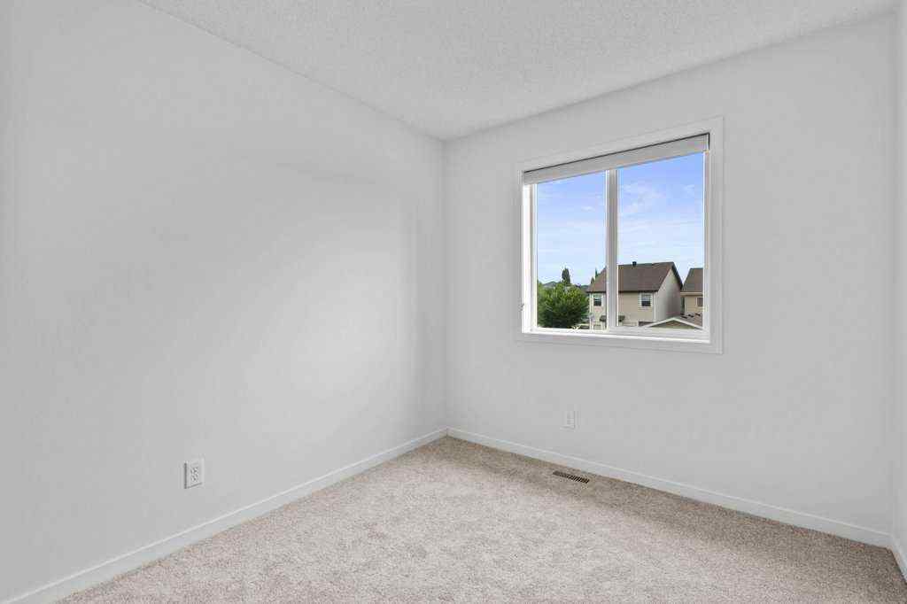 MLS® A2242857 - 2013 New Brighton Park SE in New Brighton Calgary, Residential