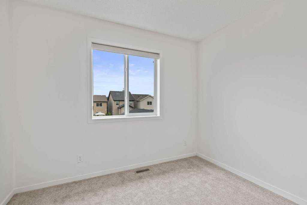 MLS® A2242857 - 2013 New Brighton Park SE in New Brighton Calgary, Residential