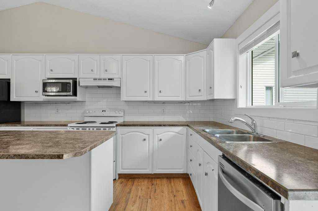 MLS® A2242858 - 1218 Grey Avenue  in NONE Crossfield, Residential