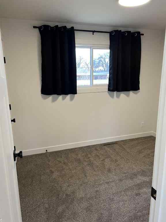 MLS® A2242944 - 4932 57 Avenue  in NONE Taber, Multi-Family