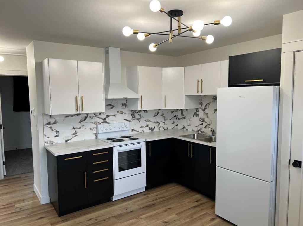 MLS® A2242944 - 4932 57 Avenue  in NONE Taber, Multi-Family