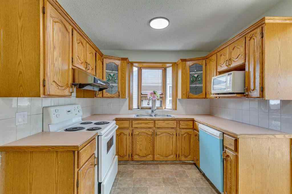 MLS® A2242967 - 411 Rundleson Place NE in Rundle Calgary, Residential