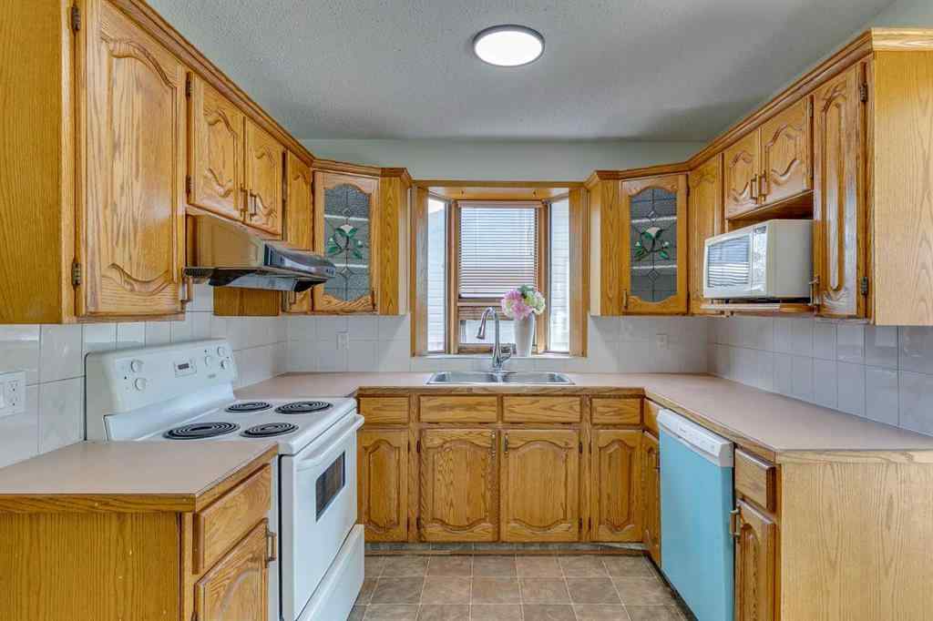 MLS® A2242967 - 411 Rundleson Place NE in Rundle Calgary, Residential