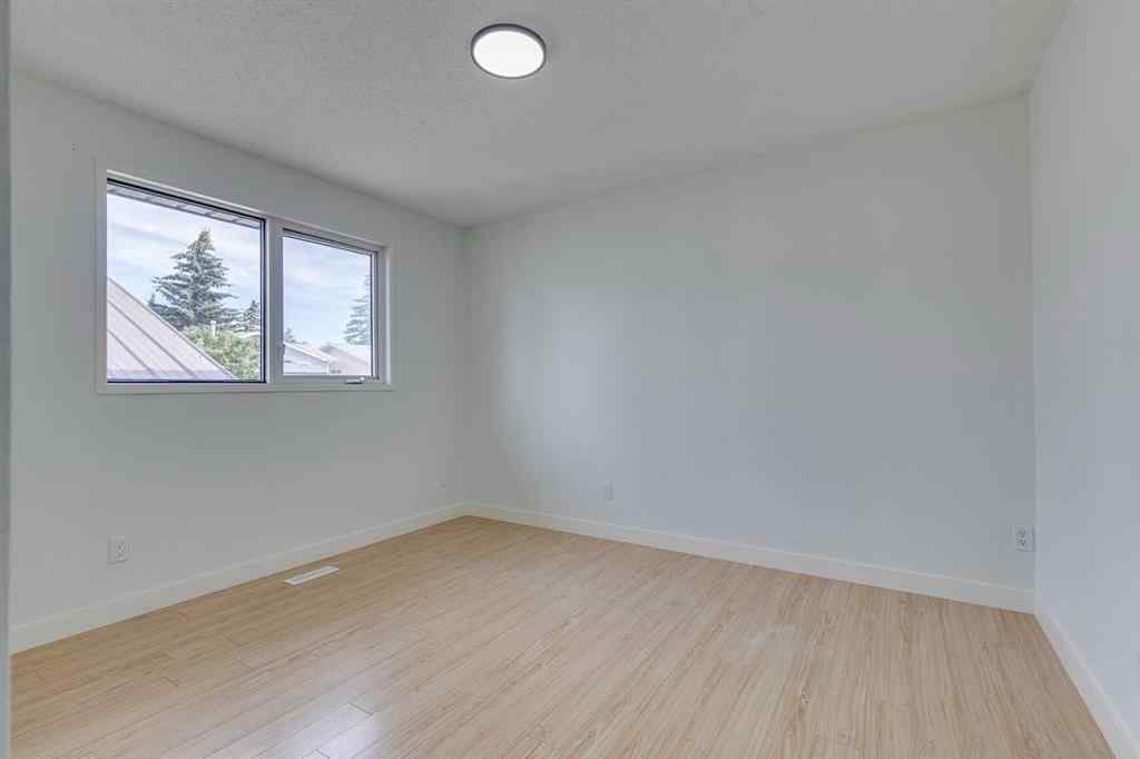 MLS® A2242967 - 411 Rundleson Place NE in Rundle Calgary, Residential
