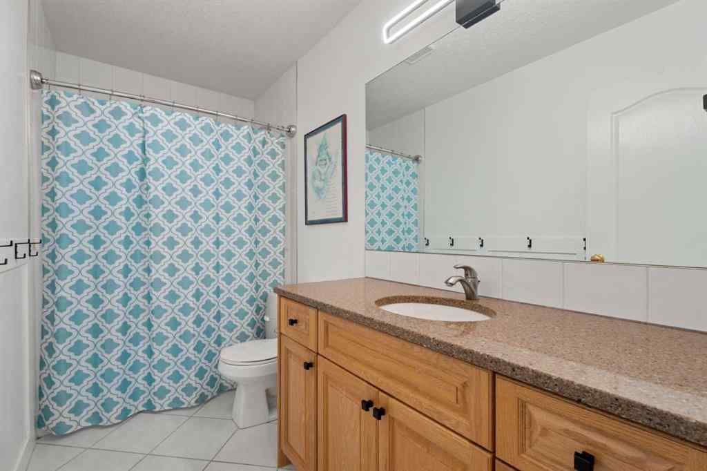 MLS® A2242970 - 857 West Chesteremere Drive  in Chesterview Estates Chestermere, Residential