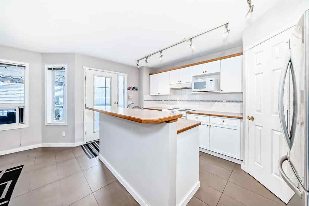 MLS® A2243046 - 9747 Harvest Hills Link NE in Harvest Hills Calgary, Residential