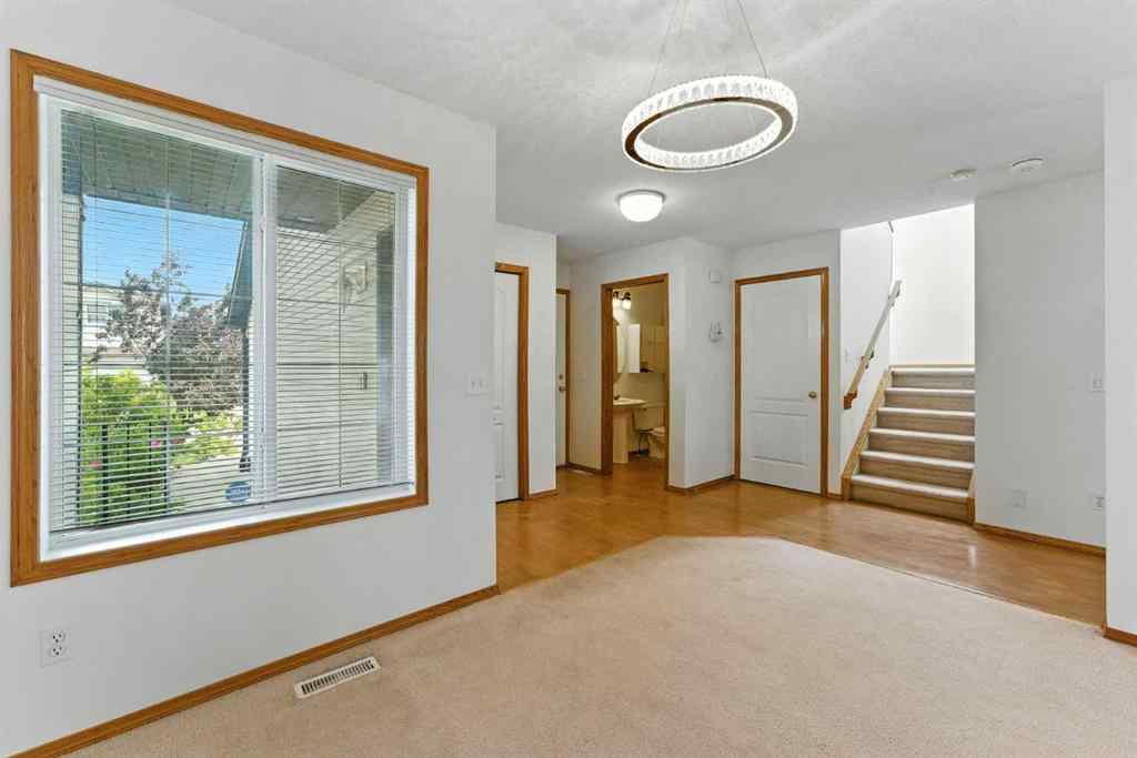 MLS® A2243052 - 34 Tuscarora Way NW in Tuscany Calgary, Residential