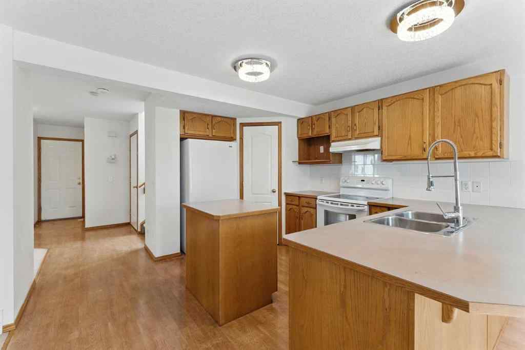 MLS® A2243052 - 34 Tuscarora Way NW in Tuscany Calgary, Residential