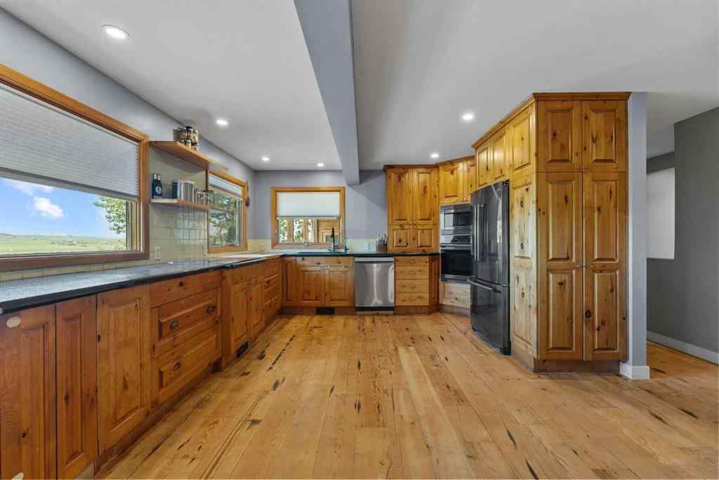 MLS® A2243067 - Unit #200 32075 402 Avenue W in NONE Rural Foothills County, Residential