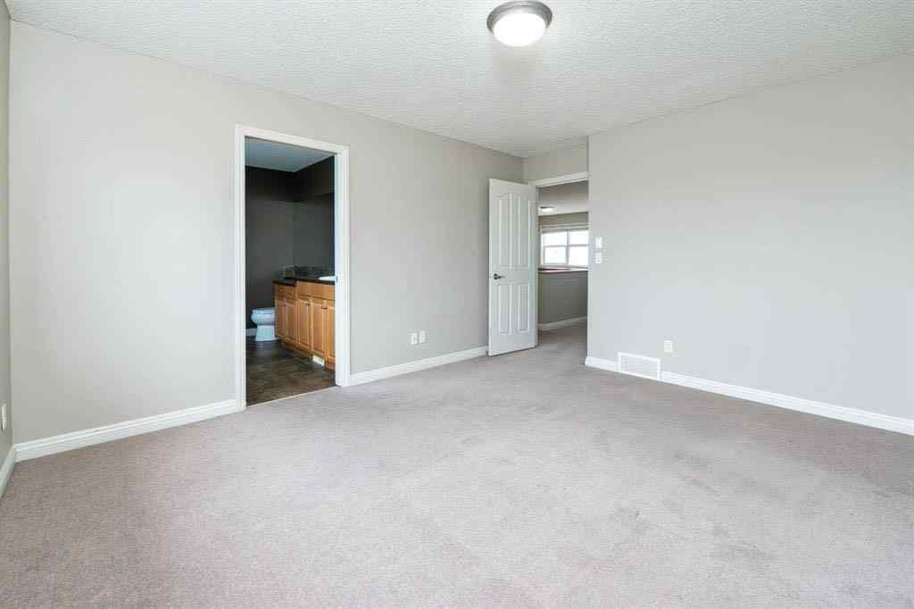 MLS® A2243073 - 311 Sagewood Landing SW in Sagewood Airdrie, Residential