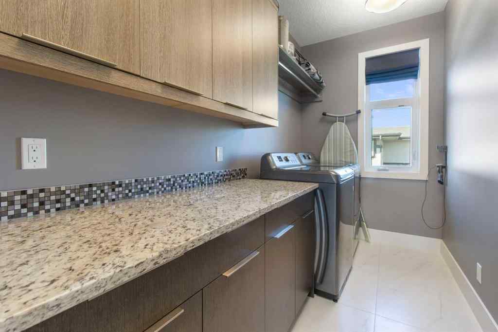 MLS® A2243099 - 67 Stoneypointe Place  in Watermark Rural Rocky View County, Residential