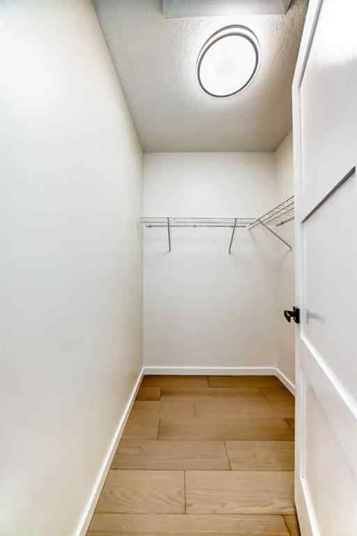 MLS® A2243109 - 64 Woodstock Road SW in Woodlands Calgary, Residential
