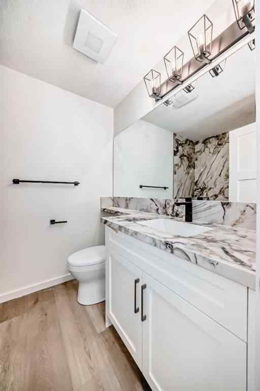 MLS® A2243109 - 64 Woodstock Road SW in Woodlands Calgary, Residential