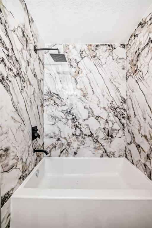 MLS® A2243109 - 64 Woodstock Road SW in Woodlands Calgary, Residential
