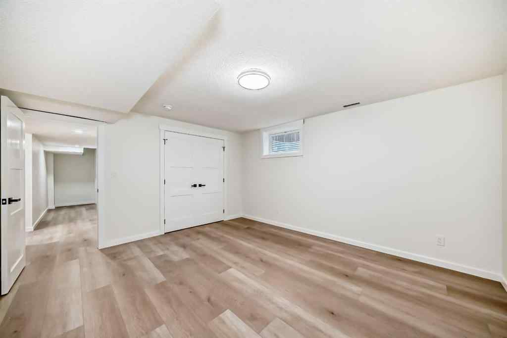 MLS® A2243109 - 64 Woodstock Road SW in Woodlands Calgary, Residential