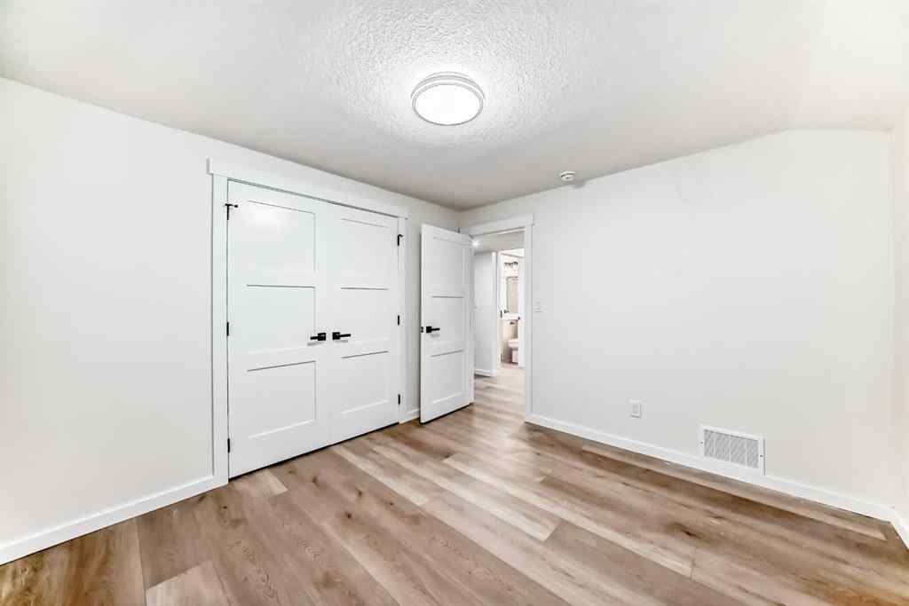 MLS® A2243109 - 64 Woodstock Road SW in Woodlands Calgary, Residential