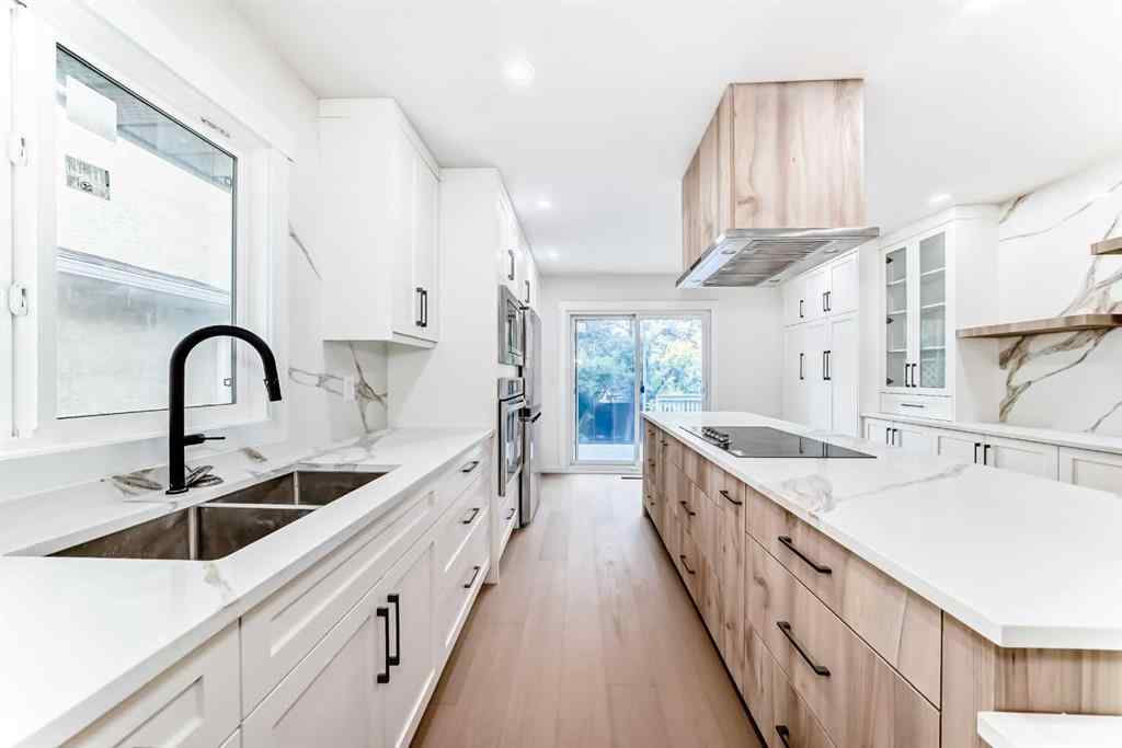 MLS® A2243109 - 64 Woodstock Road SW in Woodlands Calgary, Residential