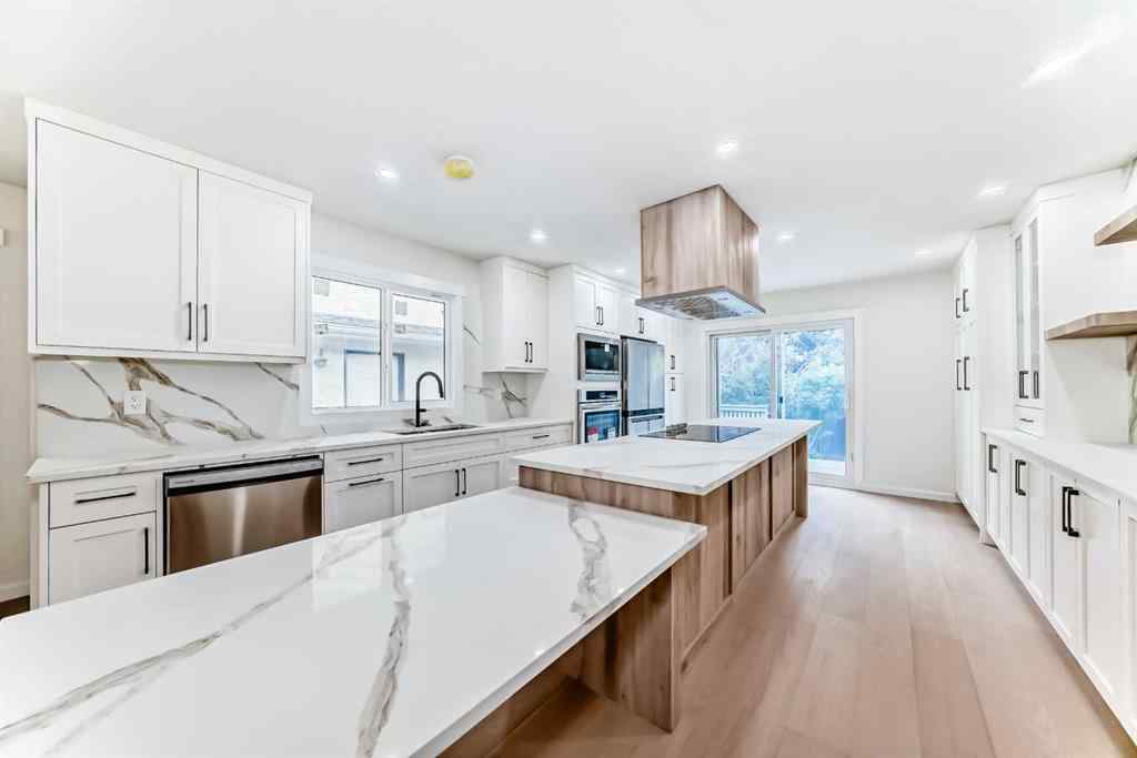 MLS® A2243109 - 64 Woodstock Road SW in Woodlands Calgary, Residential