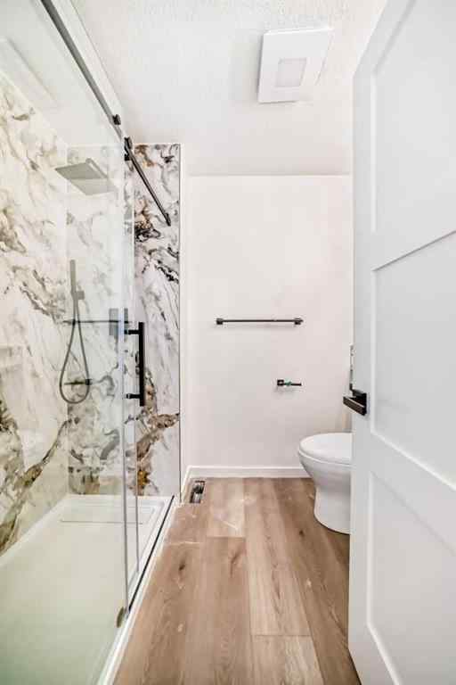 MLS® A2243109 - 64 Woodstock Road SW in Woodlands Calgary, Residential