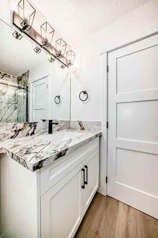 MLS® A2243109 - 64 Woodstock Road SW in Woodlands Calgary, Residential