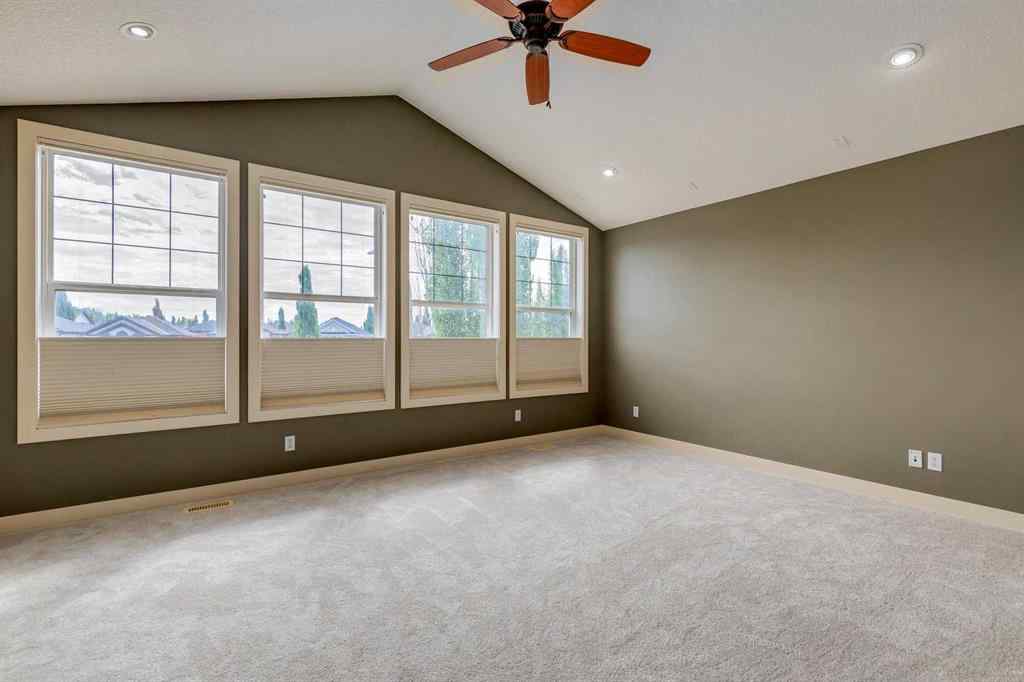 MLS® A2243122 - 94 Tuscany Summit Green NW in Tuscany Calgary, Residential