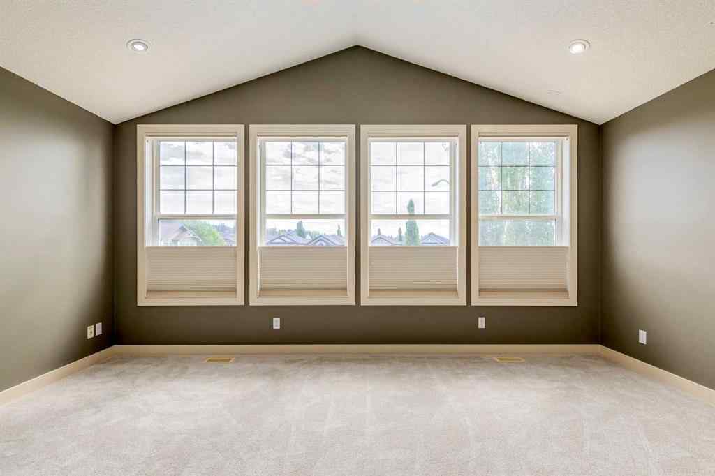 MLS® A2243122 - 94 Tuscany Summit Green NW in Tuscany Calgary, Residential