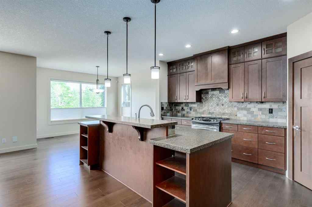 MLS® A2243122 - 94 Tuscany Summit Green NW in Tuscany Calgary, Residential