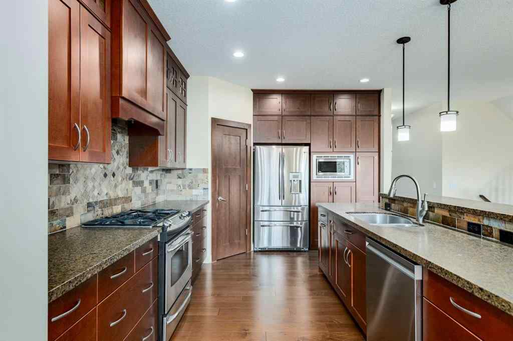 MLS® A2243122 - 94 Tuscany Summit Green NW in Tuscany Calgary, Residential